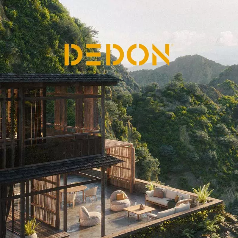 Ein modernes Haus mit Dedon Möbeln auf einer Terrasse inmitten einer malerischen Berglandschaft mit Fluss und Wasserfall im Hintergrund.